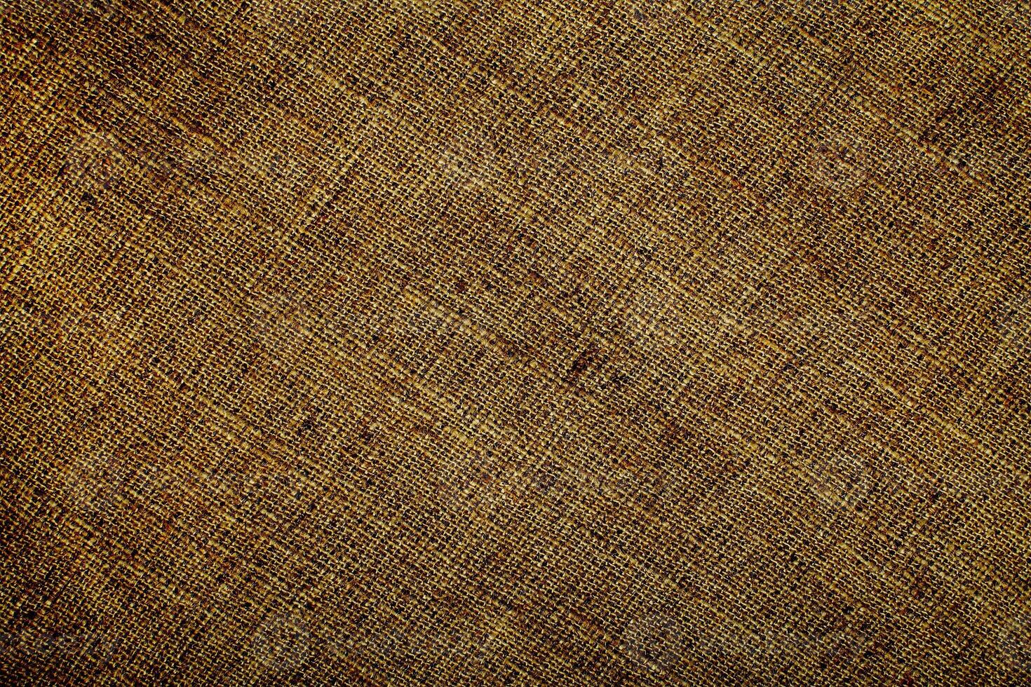 Natural linen material textile canvas Fabric texture background Close-up detail of fabric natural color Hemp material pattern design wallpaper. can be used as background or for graphic design photo