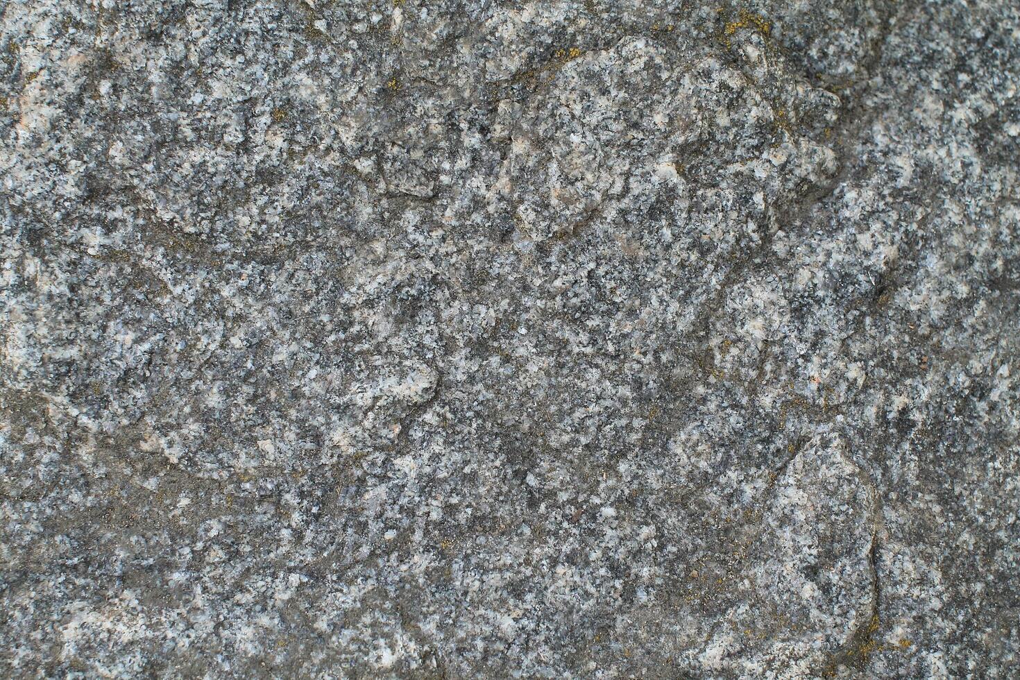 Abstract natural rock stone granite grunge rusty metal texture design background natural color stone material granite design wallpaper. Close-up detail of natural stone photo