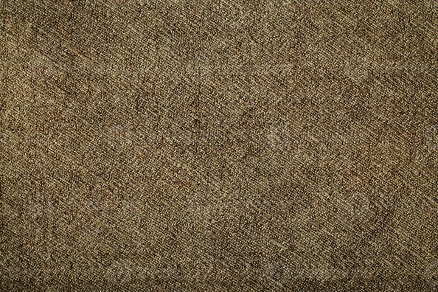 Natural linen material textile canvas Fabric texture background Close-up detail of fabric natural color Hemp material pattern design wallpaper. can be used as background or for graphic design photo