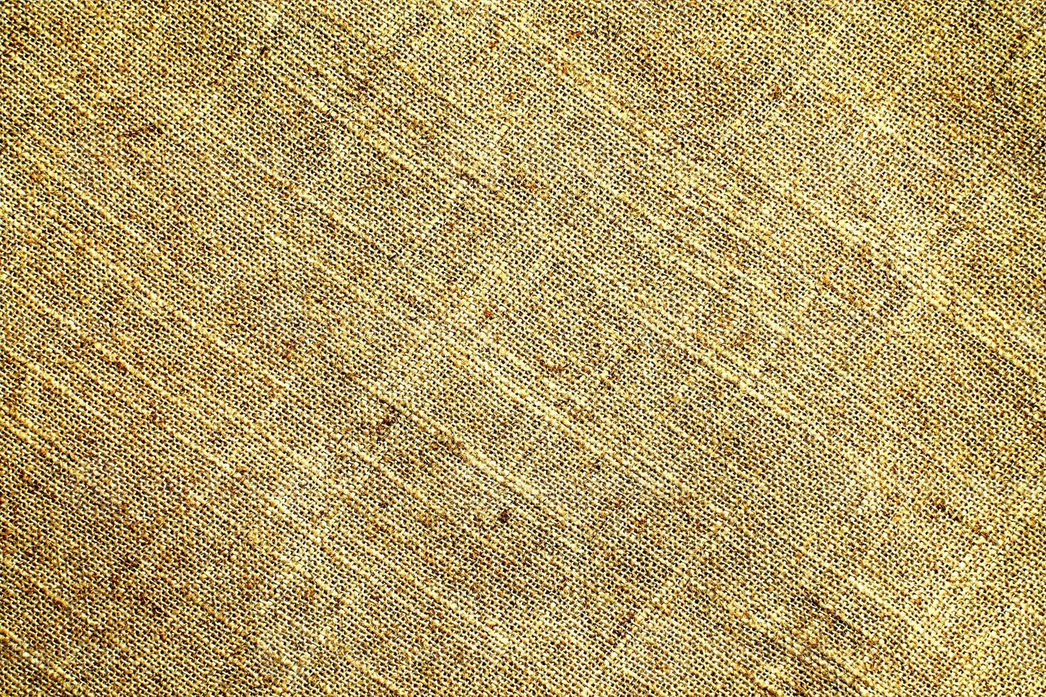 Natural linen material textile canvas Fabric texture background Close-up detail of fabric natural color Hemp material pattern design wallpaper. can be used as background or for graphic design photo