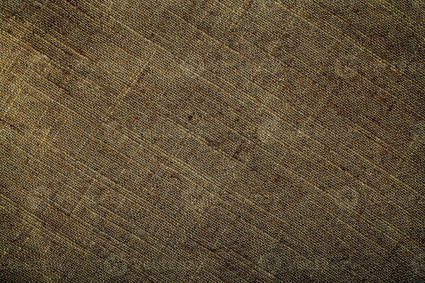 Natural linen material textile canvas Fabric texture background Close-up detail of fabric natural color Hemp material pattern design wallpaper. can be used as background or for graphic design photo