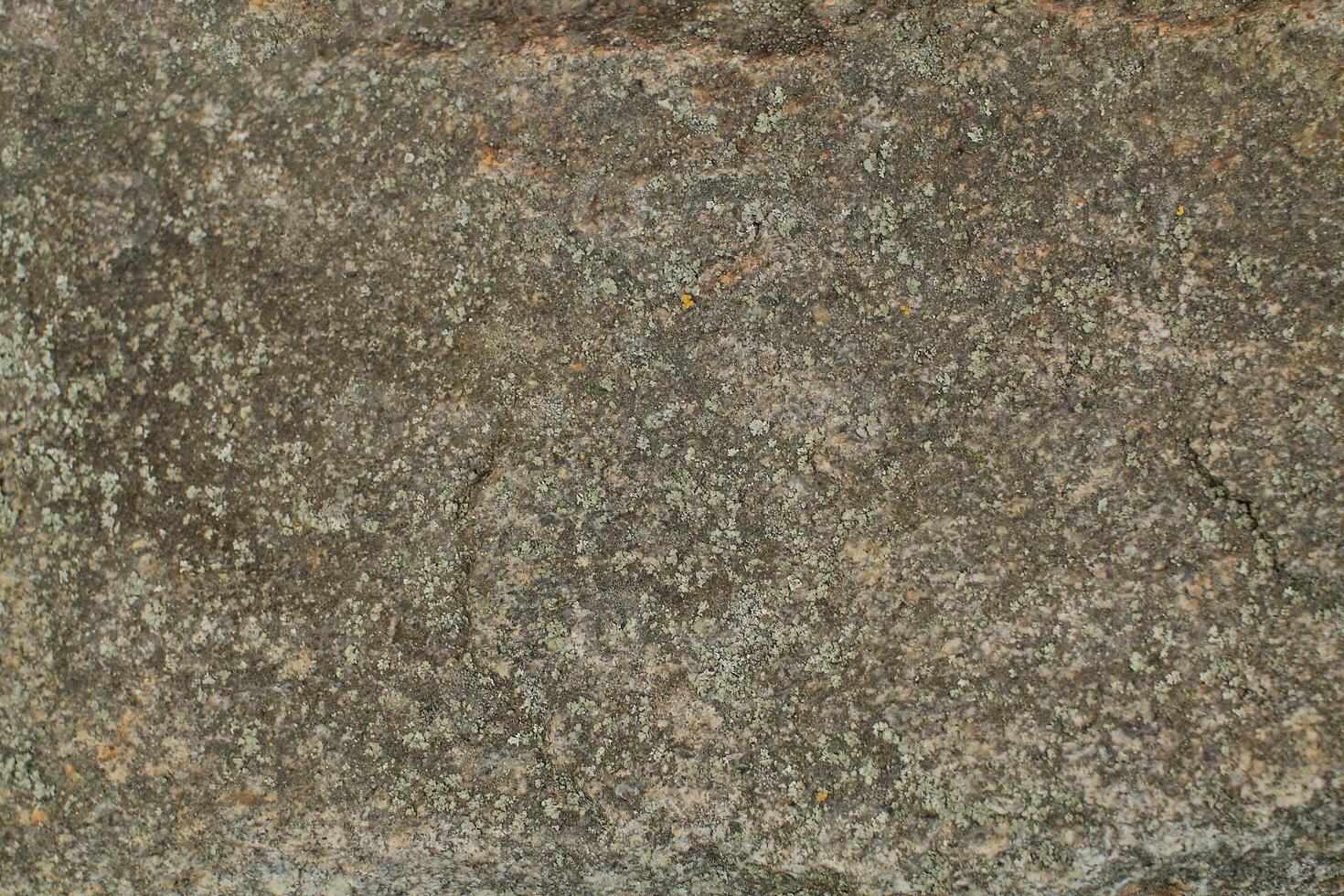 Abstract natural rock stone granite grunge rusty metal texture design background natural color stone material granite design wallpaper. Close-up detail of natural stone photo
