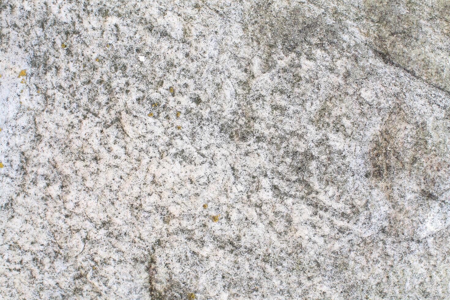 Abstract natural rock stone granite grunge rusty metal texture design background natural color stone material granite design wallpaper. Close-up detail of natural stone photo