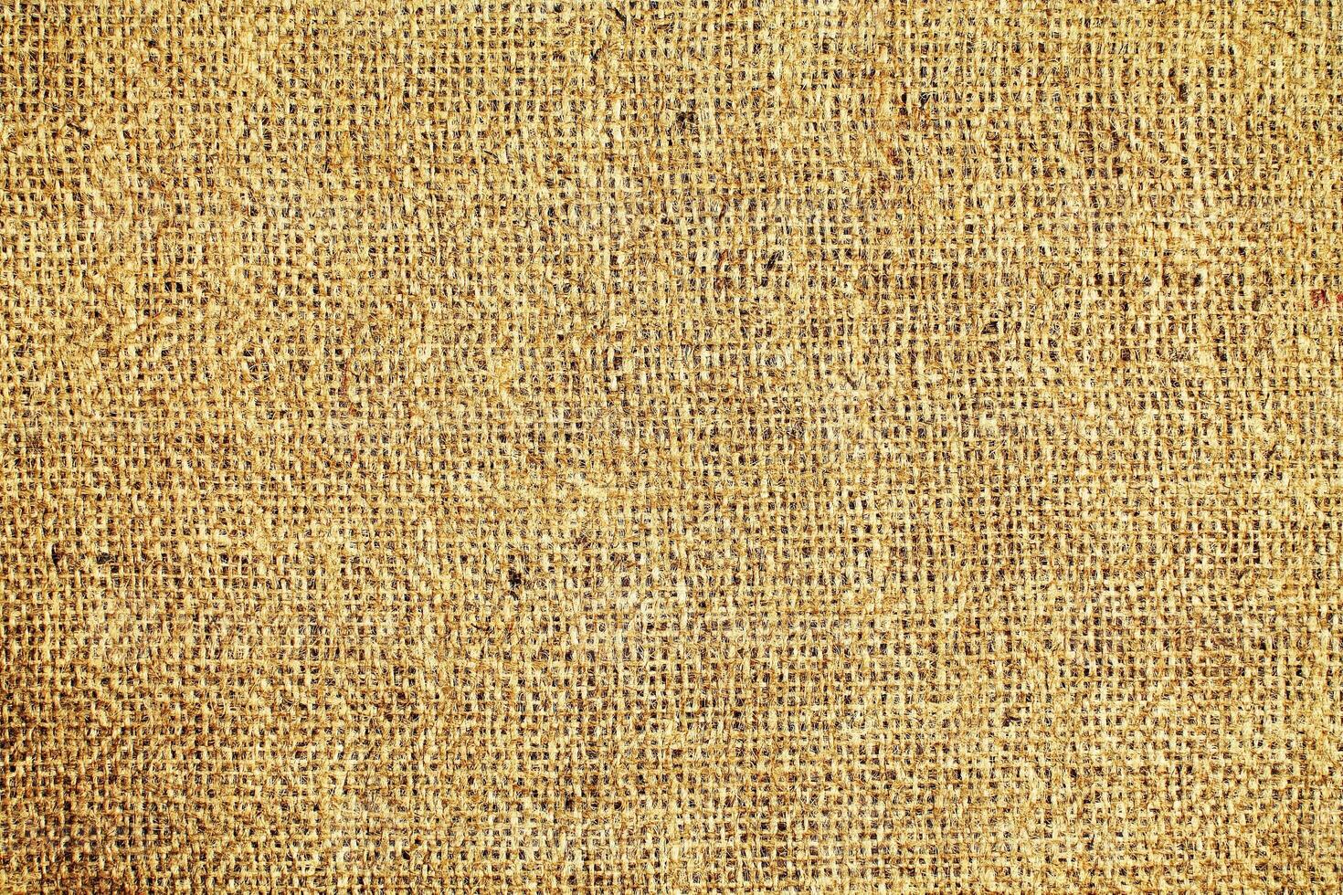 Natural linen material textile canvas Fabric texture background Close-up detail of fabric natural color Hemp material pattern design wallpaper. can be used as background or for graphic design photo