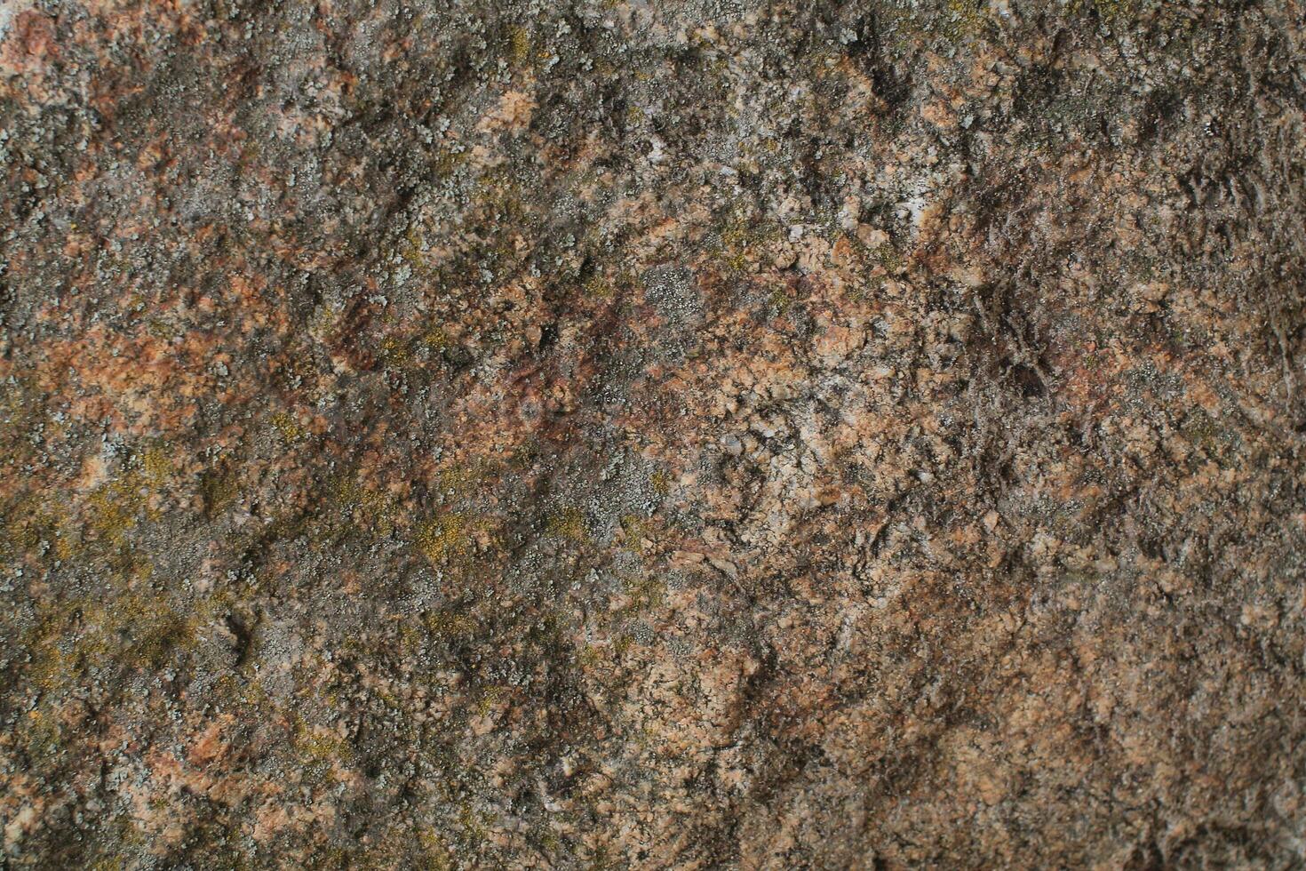 Abstract natural rock stone granite grunge rusty metal texture design background natural color stone material granite design wallpaper. Close-up detail of natural stone photo