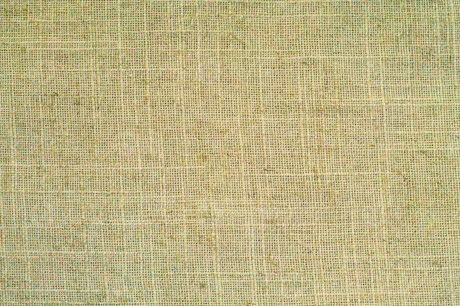 Natural linen material textile canvas Fabric texture background Close-up detail of fabric natural color Hemp material pattern design wallpaper. can be used as background or for graphic design photo