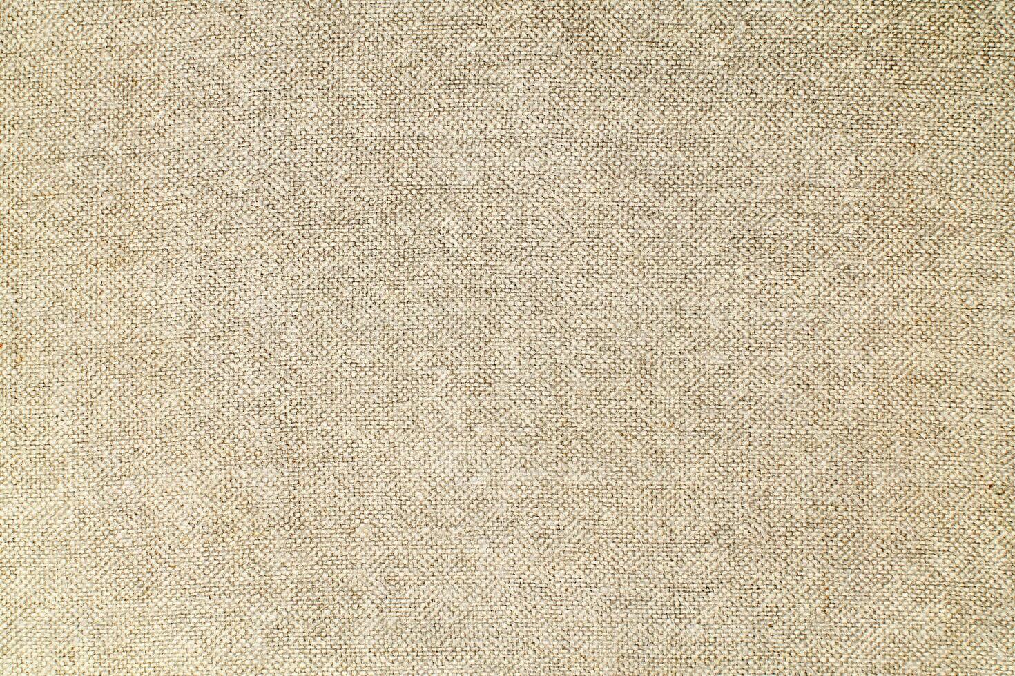 Natural linen material textile canvas Fabric texture background Close-up detail of fabric natural color Hemp material pattern design wallpaper. can be used as background or for graphic design photo