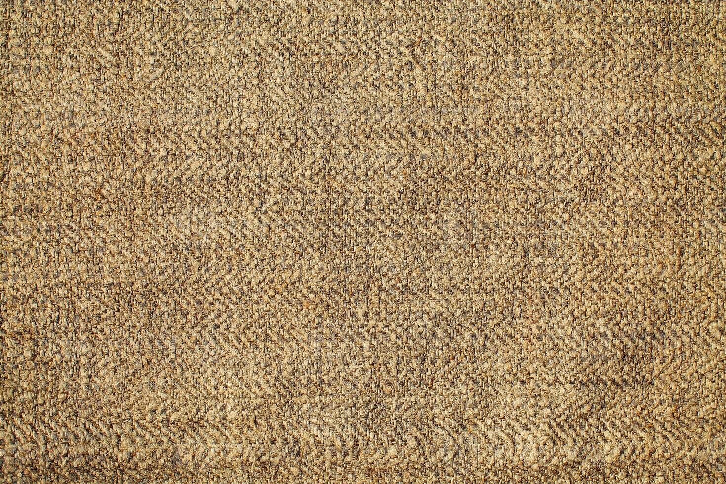Natural linen material textile canvas Fabric texture background Close-up detail of fabric natural color Hemp material pattern design wallpaper. can be used as background or for graphic design photo