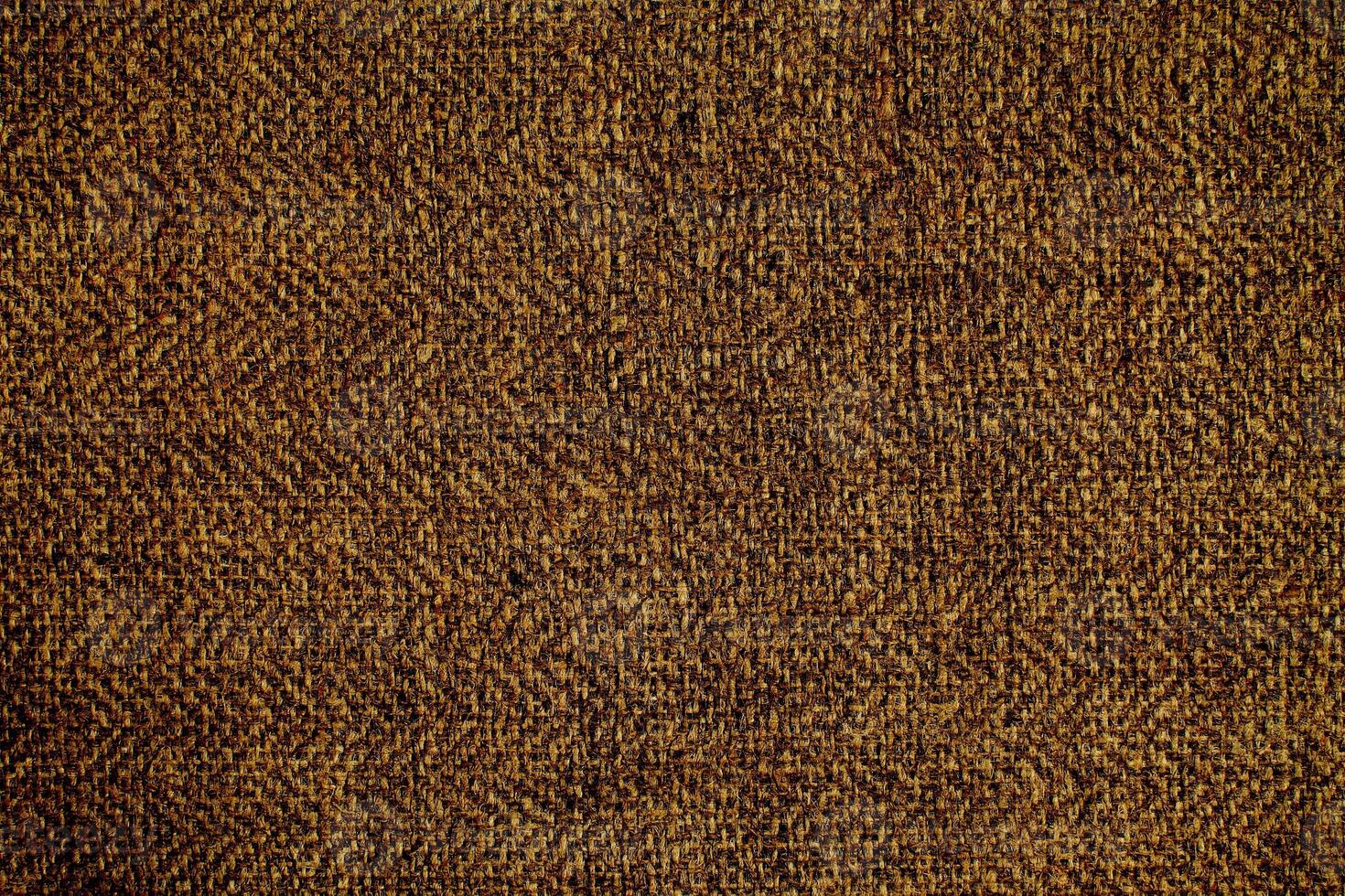 Natural linen material textile canvas Fabric texture background Close-up detail of fabric natural color Hemp material pattern design wallpaper. can be used as background or for graphic design photo