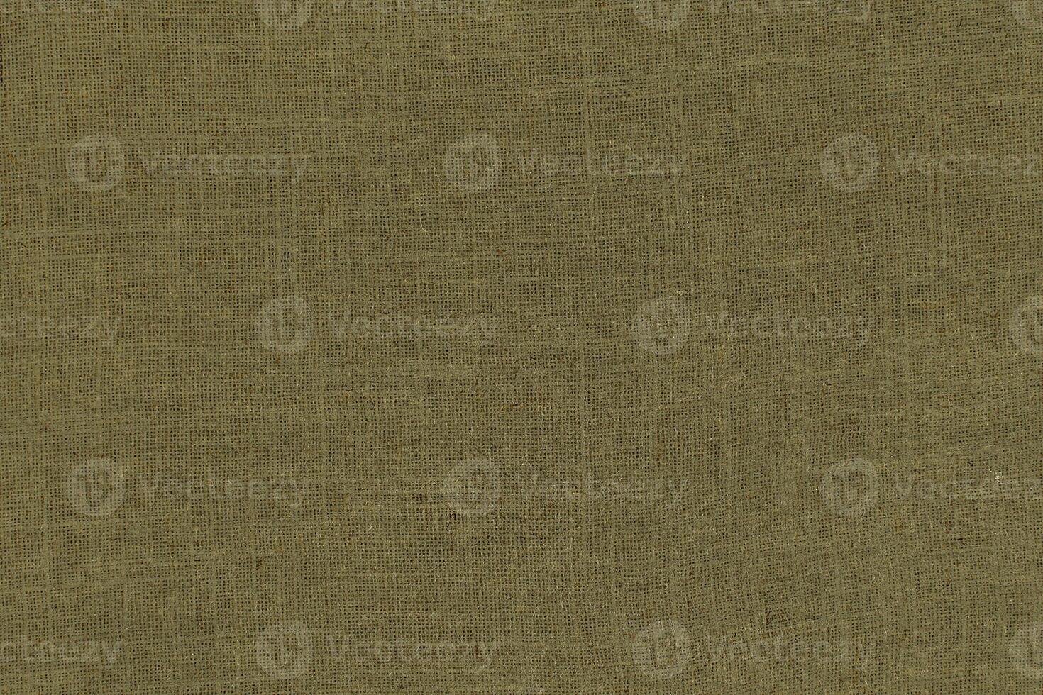 Natural linen material textile canvas Fabric texture background Close-up detail of fabric natural color Hemp material pattern design wallpaper. can be used as background or for graphic design photo