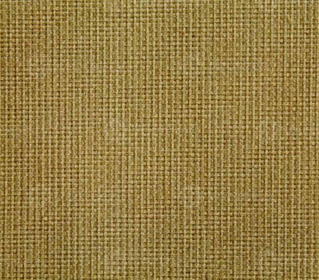 Natural linen material textile canvas Fabric texture background Close-up detail of fabric natural color Hemp material pattern design wallpaper. can be used as background or for graphic design photo