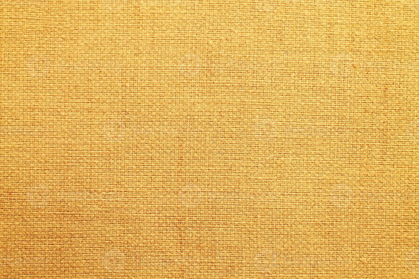 Natural linen material textile canvas Fabric texture background Close-up detail of fabric natural color Hemp material pattern design wallpaper. can be used as background or for graphic design photo
