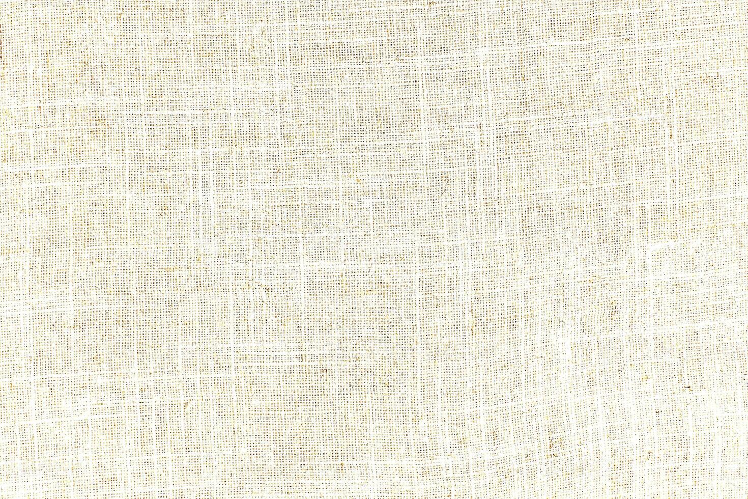 Natural linen material textile canvas Fabric texture background Close-up detail of fabric natural color Hemp material pattern design wallpaper. can be used as background or for graphic design photo