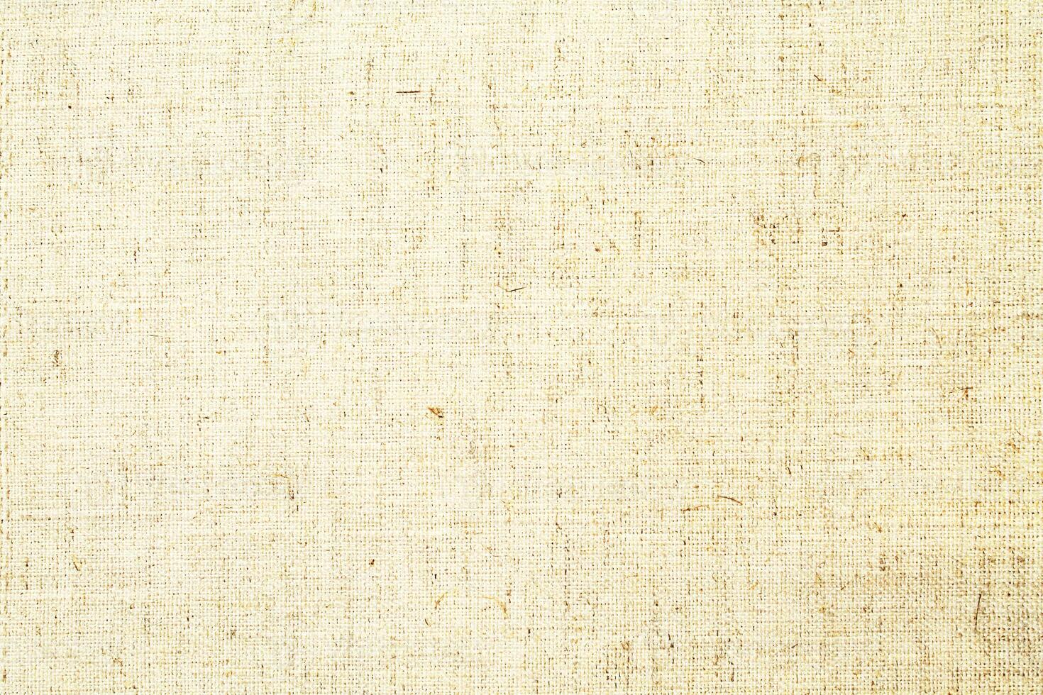 Natural linen material textile canvas Fabric texture background Close-up detail of fabric natural color Hemp material pattern design wallpaper. can be used as background or for graphic design photo