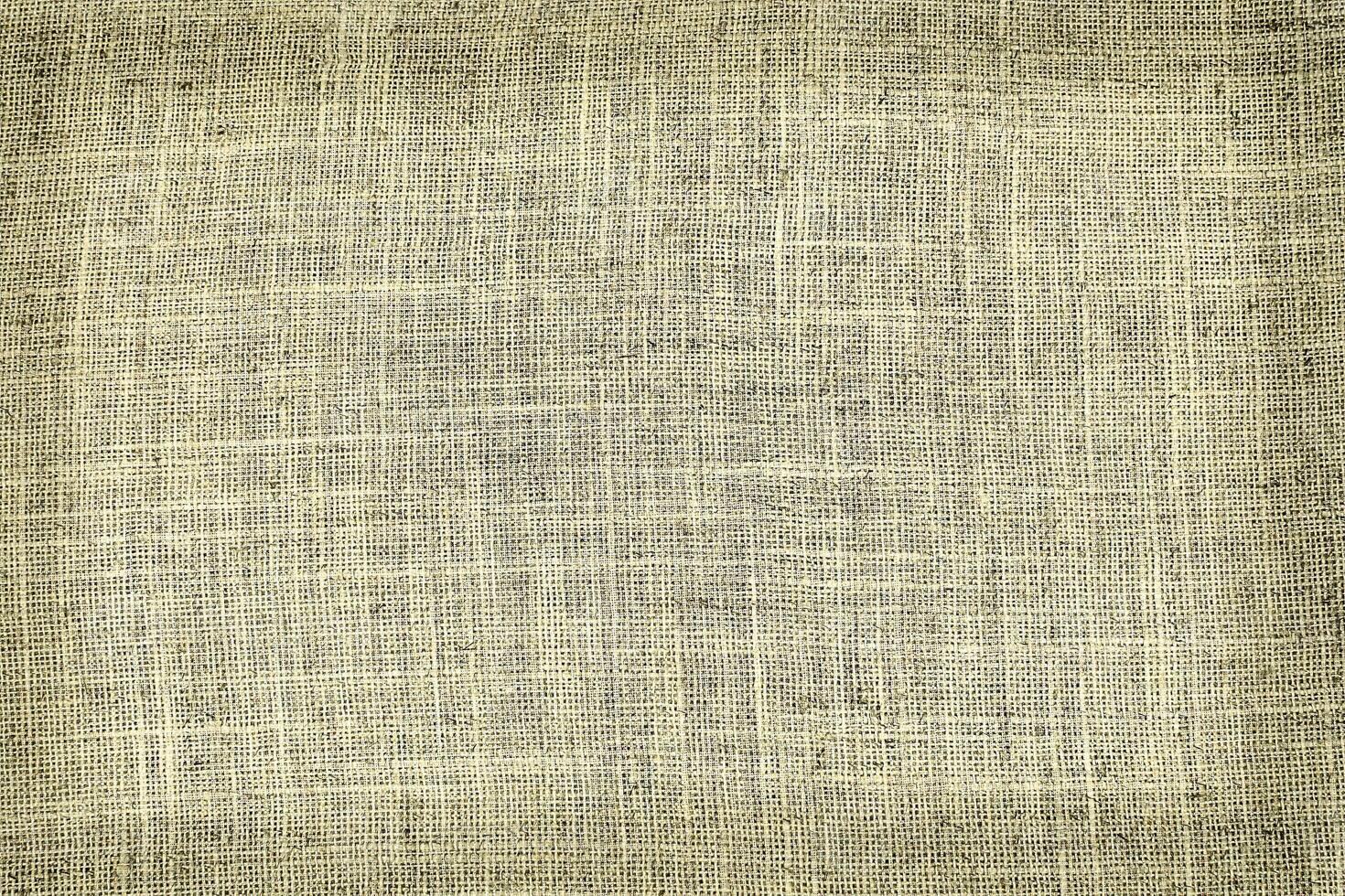 Natural linen material textile canvas Fabric texture background Close-up detail of fabric natural color Hemp material pattern design wallpaper. can be used as background or for graphic design photo