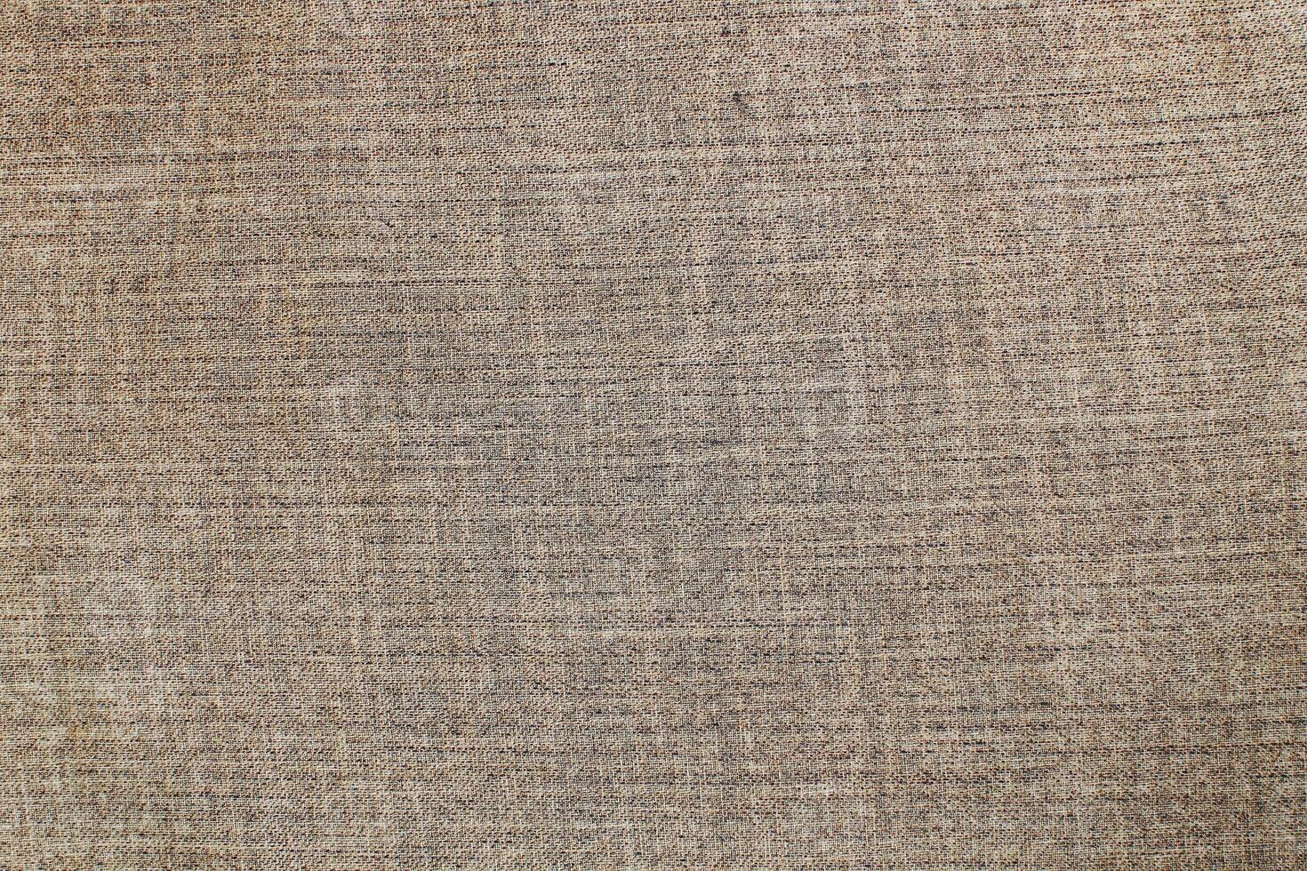 Natural linen material textile canvas Fabric texture background Close-up detail of fabric natural color Hemp material pattern design wallpaper. can be used as background or for graphic design photo