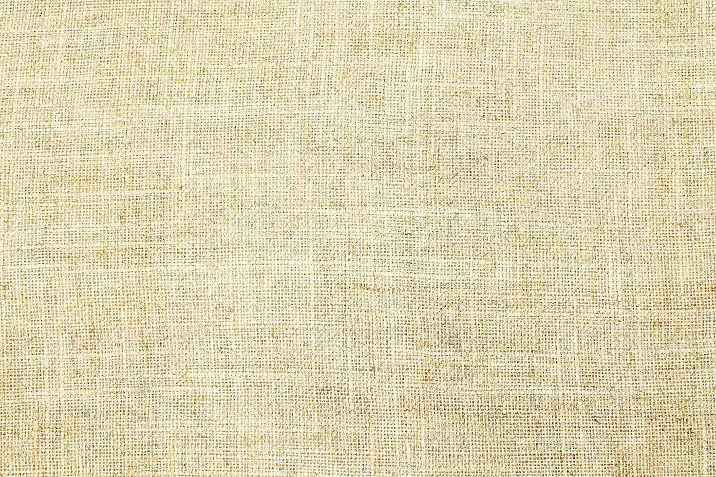 Natural linen material textile canvas Fabric texture background Close-up detail of fabric natural color Hemp material pattern design wallpaper. can be used as background or for graphic design photo