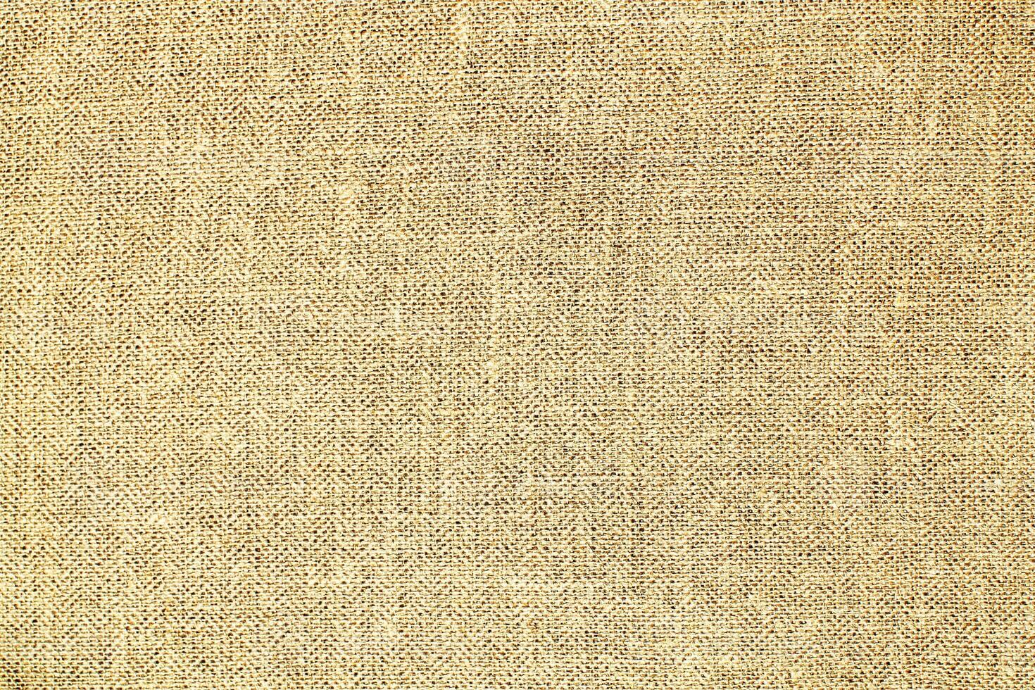 Natural linen material textile canvas Fabric texture background Close-up detail of fabric natural color Hemp material pattern design wallpaper. can be used as background or for graphic design photo