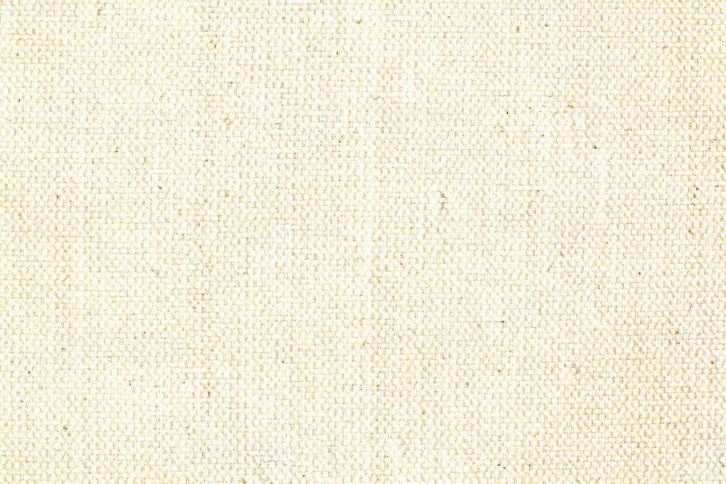 Natural linen material textile canvas Fabric texture background Close-up detail of fabric natural color Hemp material pattern design wallpaper. can be used as background or for graphic design photo