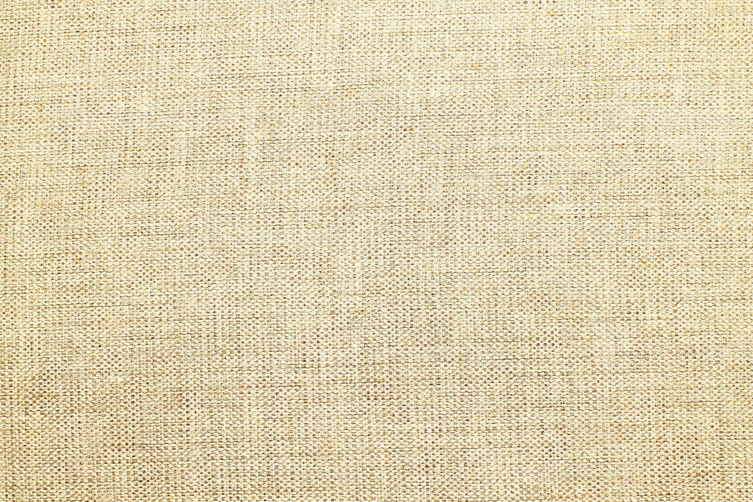 Natural linen material textile canvas Fabric texture background Close-up detail of fabric natural color Hemp material pattern design wallpaper. can be used as background or for graphic design photo