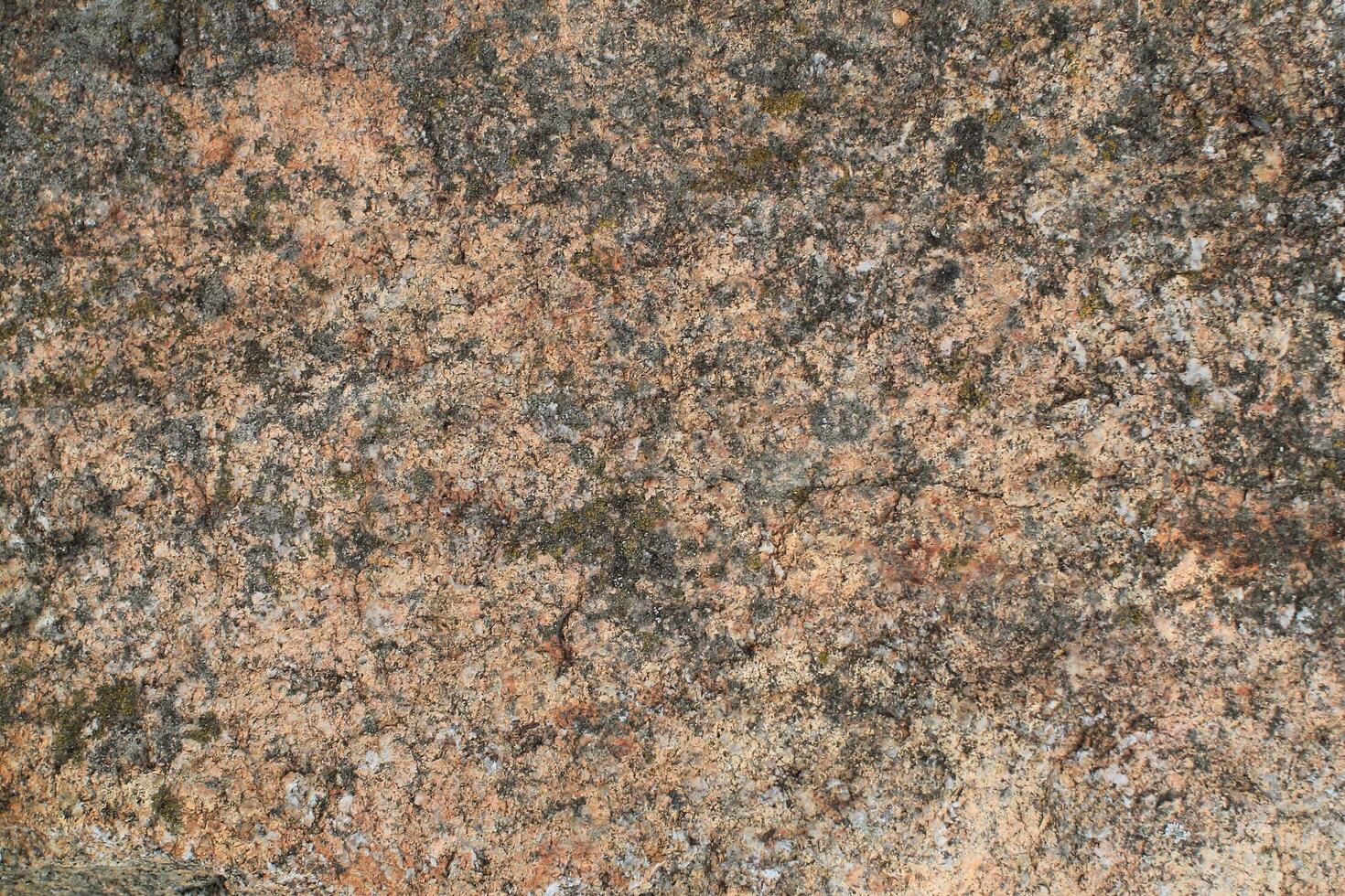 Abstract natural rock stone granite grunge rusty metal texture design background natural color stone material granite design wallpaper. Close-up detail of natural stone photo