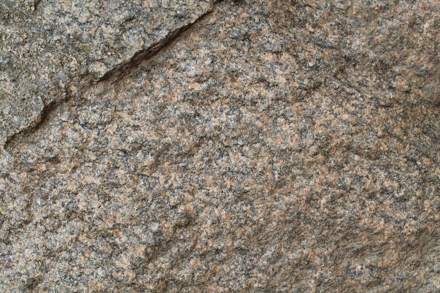 Abstract natural rock stone granite grunge rusty metal texture design background natural color stone material granite design wallpaper. Close-up detail of natural stone photo