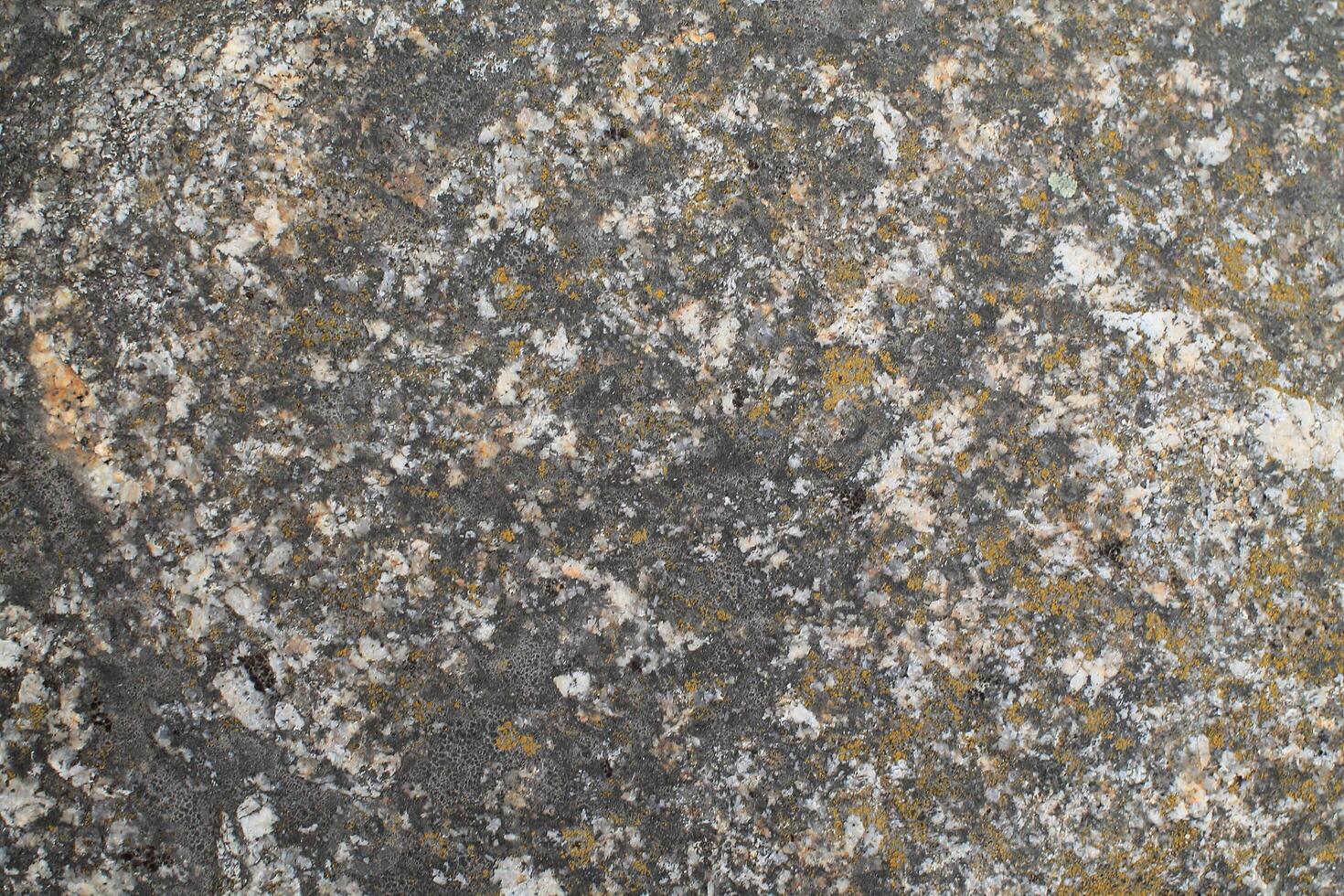 Abstract natural rock stone granite grunge rusty metal texture design background natural color stone material granite design wallpaper. Close-up detail of natural stone photo