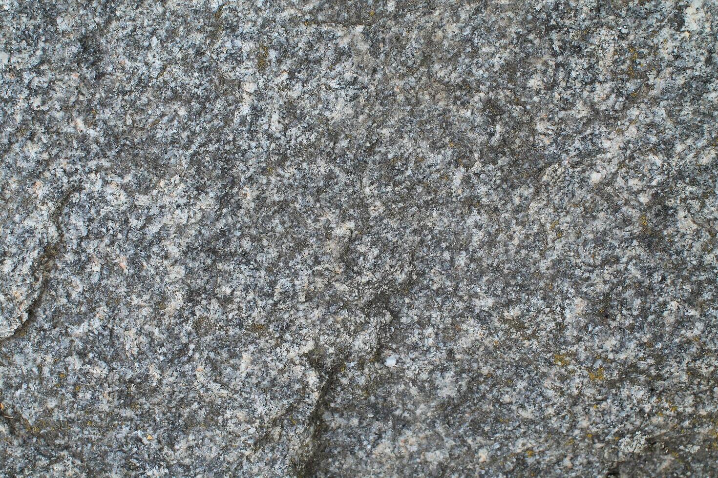 Abstract natural rock stone granite grunge rusty metal texture design background natural color stone material granite design wallpaper. Close-up detail of natural stone photo