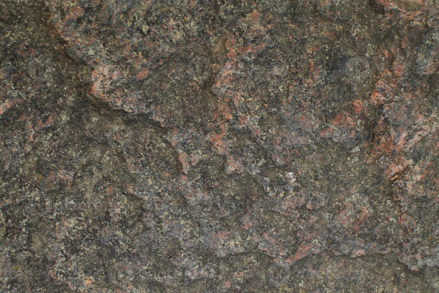 Abstract natural rock stone granite grunge rusty metal texture design background natural color stone material granite design wallpaper. Close-up detail of natural stone photo