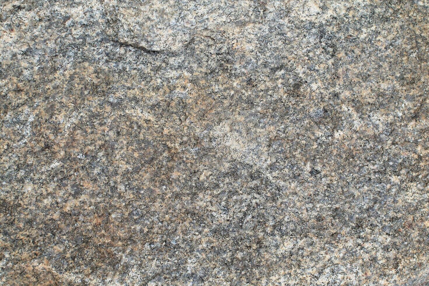 Abstract natural rock stone granite grunge rusty metal texture design background natural color stone material granite design wallpaper. Close-up detail of natural stone photo