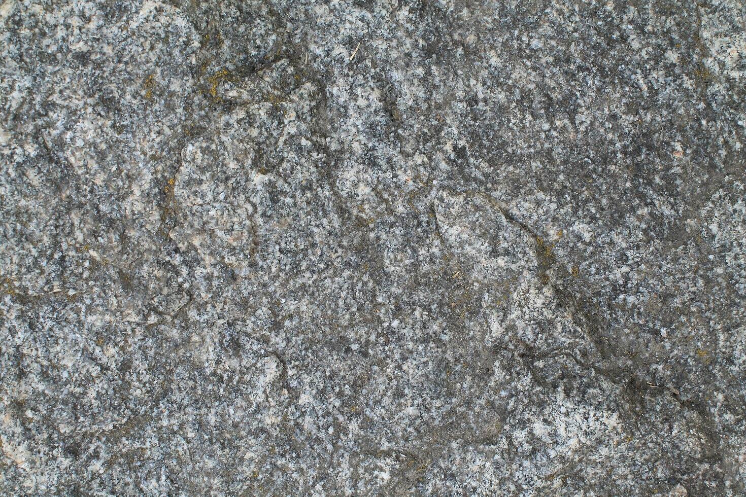 Abstract natural rock stone granite grunge rusty metal texture design background natural color stone material granite design wallpaper. Close-up detail of natural stone photo