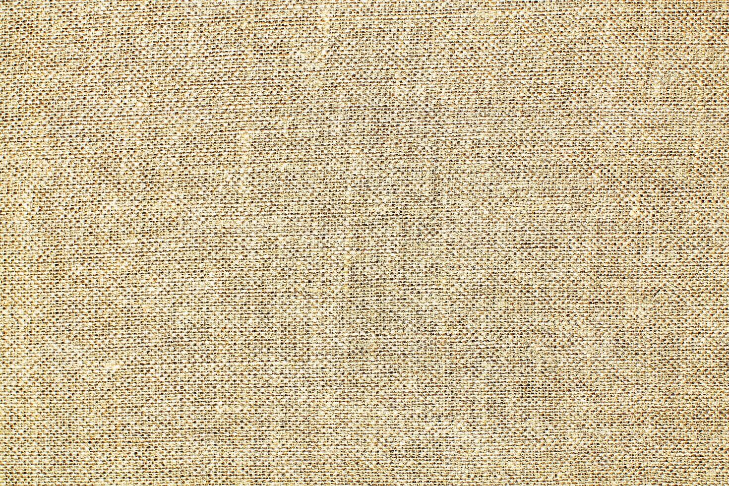 Natural linen material textile canvas Fabric texture background Close-up detail of fabric natural color Hemp material pattern design wallpaper. can be used as background or for graphic design photo
