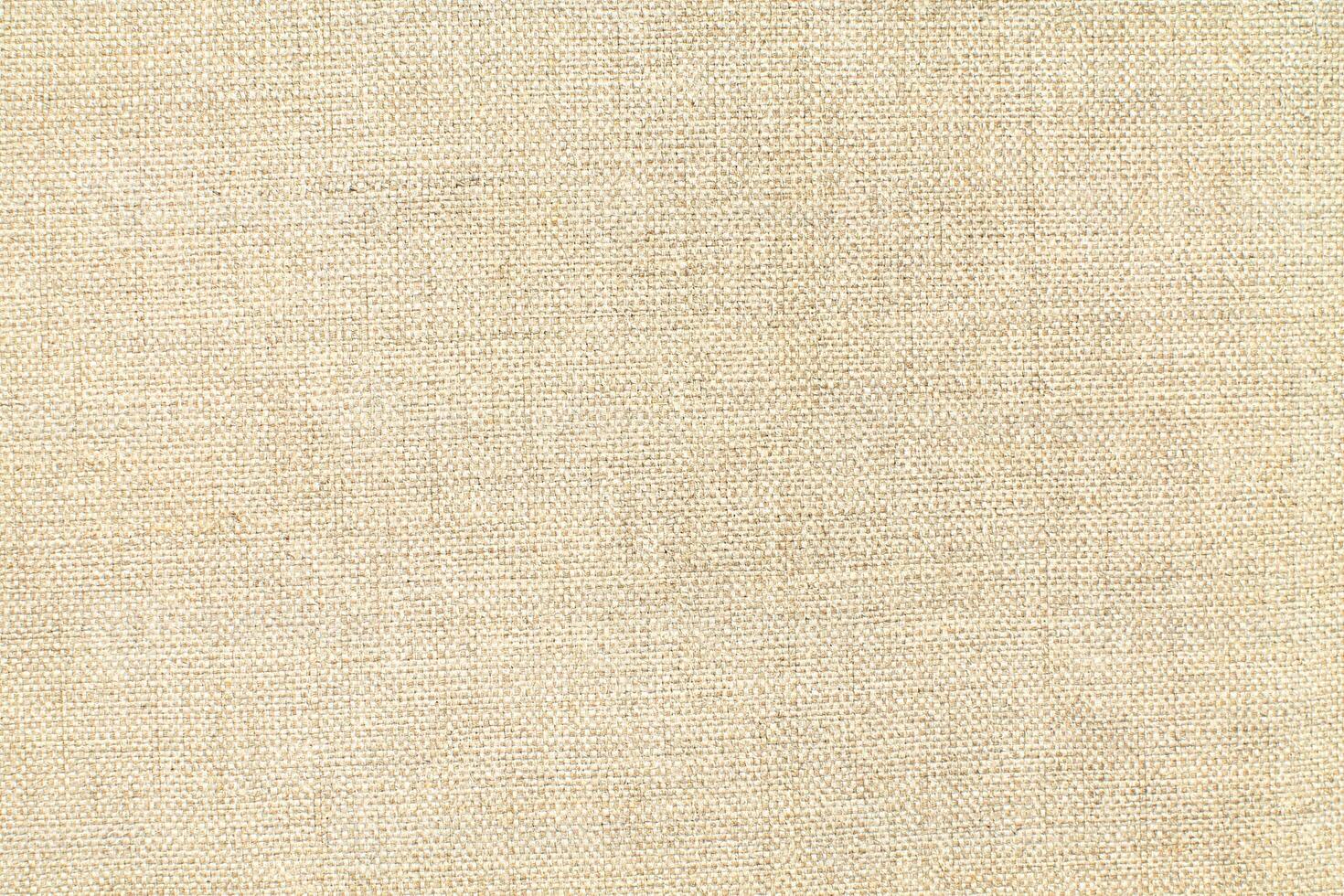 Natural linen material textile canvas Fabric texture background Close-up detail of fabric natural color Hemp material pattern design wallpaper. can be used as background or for graphic design photo