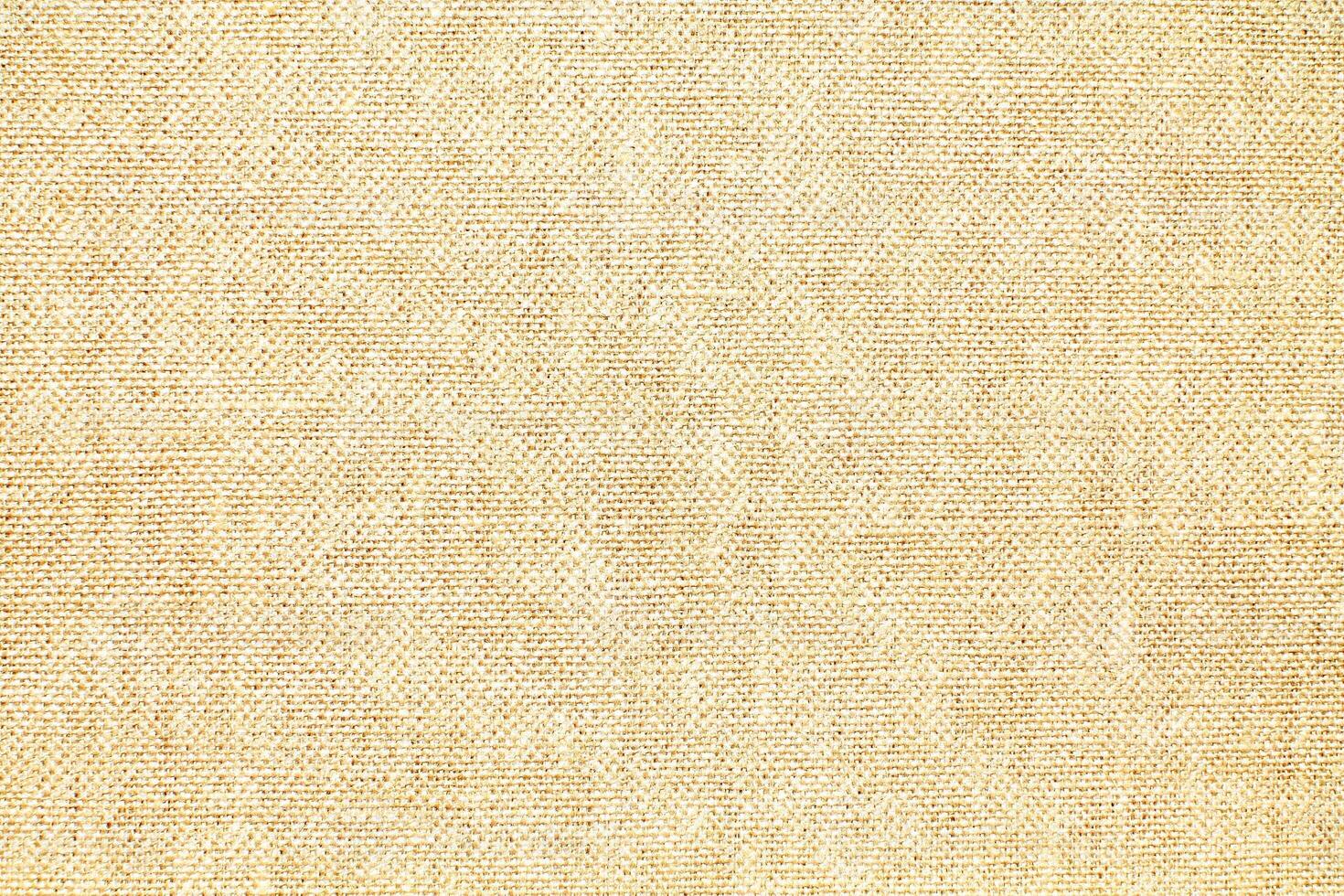 Natural linen material textile canvas Fabric texture background Close-up detail of fabric natural color Hemp material pattern design wallpaper. can be used as background or for graphic design photo