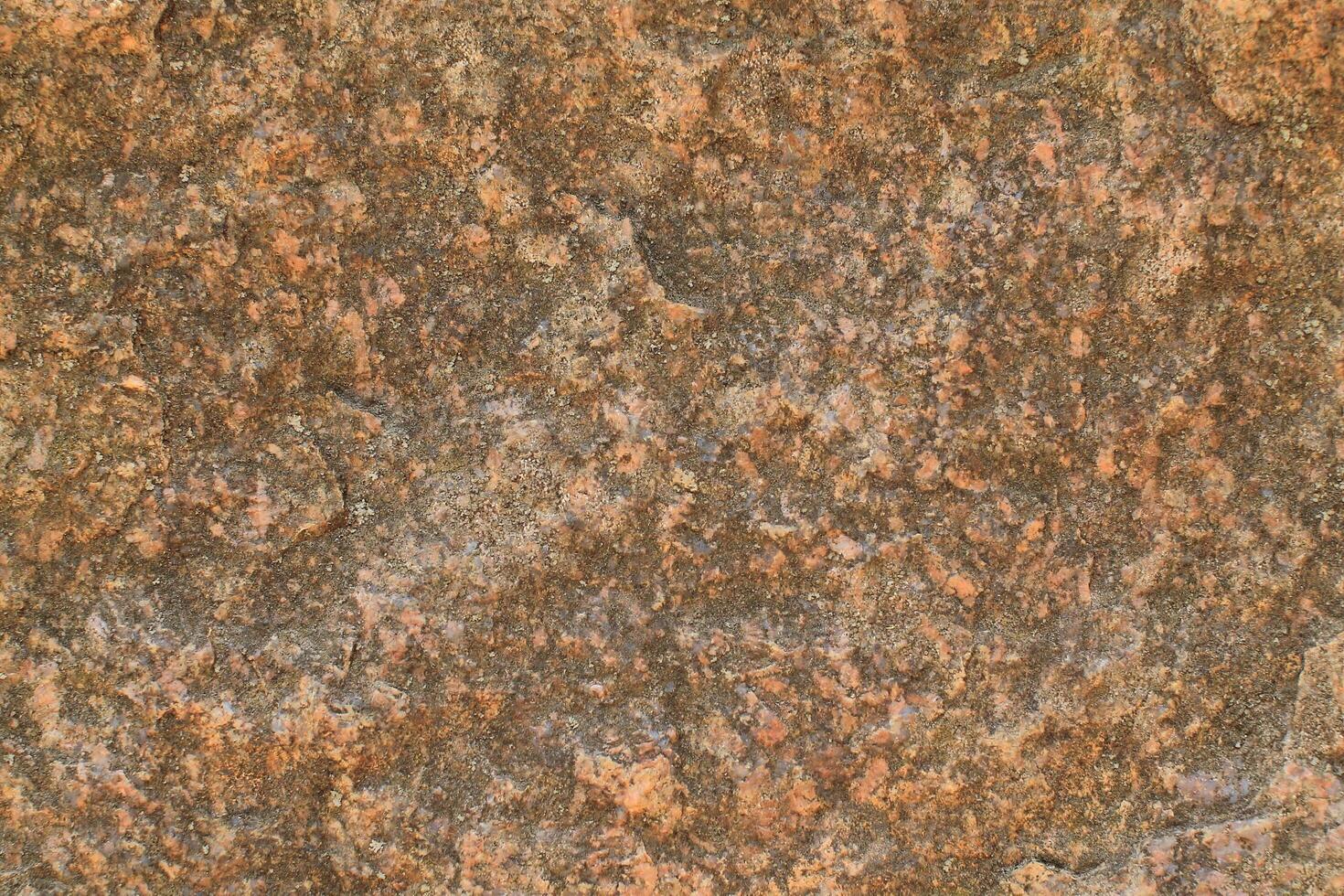 Abstract natural rock stone granite grunge rusty metal texture design background natural color stone material granite design wallpaper. Close-up detail of natural stone photo