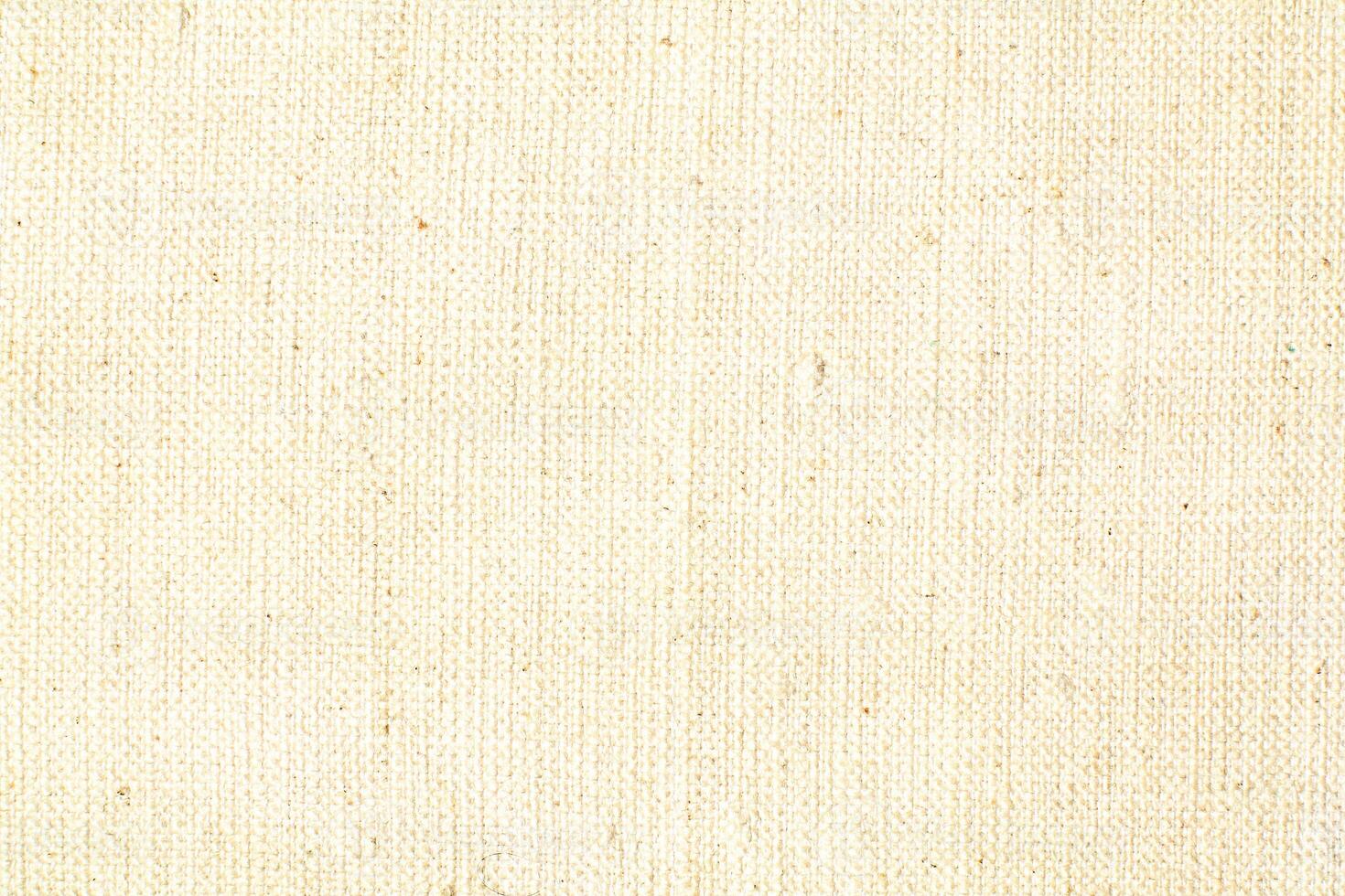 Natural linen material textile canvas Fabric texture background Close-up detail of fabric natural color Hemp material pattern design wallpaper. can be used as background or for graphic design photo