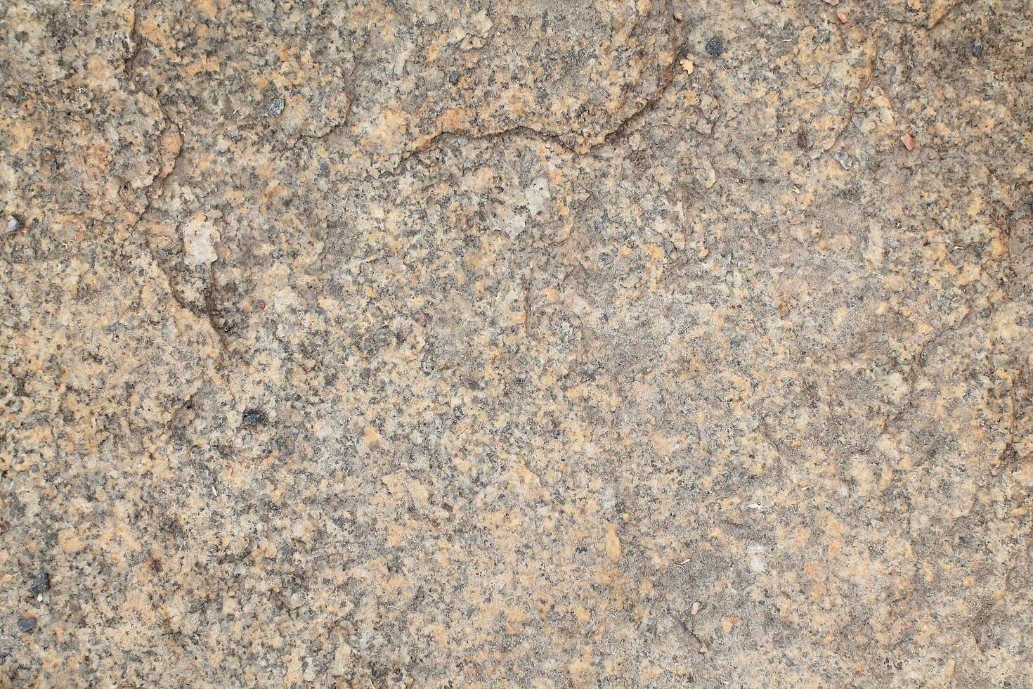 Abstract natural rock stone granite grunge rusty metal texture design background natural color stone material granite design wallpaper. Close-up detail of natural stone photo
