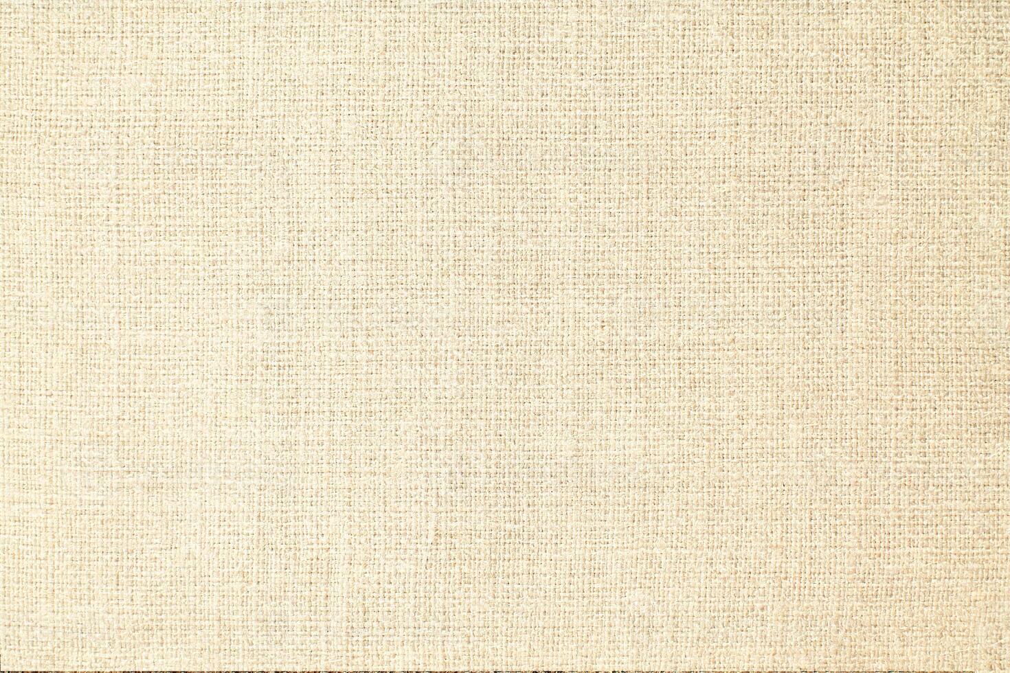 Natural linen material textile canvas Fabric texture background Close-up detail of fabric natural color Hemp material pattern design wallpaper. can be used as background or for graphic design photo