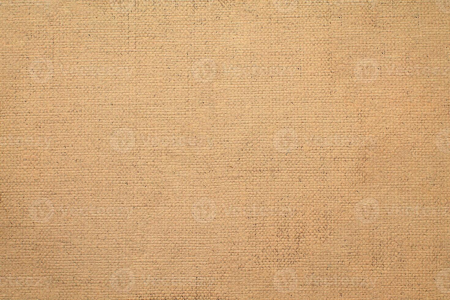 Natural linen material textile canvas Fabric texture background Close-up detail of fabric natural color Hemp material pattern design wallpaper. can be used as background or for graphic design photo