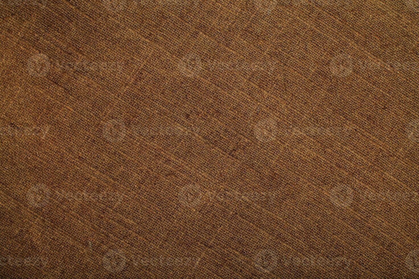 Natural linen material textile canvas Fabric texture background Close-up detail of fabric natural color Hemp material pattern design wallpaper. can be used as background or for graphic design photo