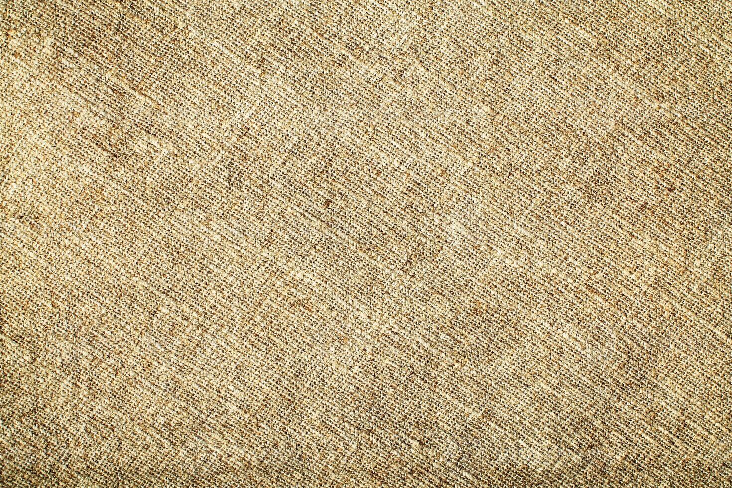 Natural linen material textile canvas Fabric texture background Close-up detail of fabric natural color Hemp material pattern design wallpaper. can be used as background or for graphic design photo