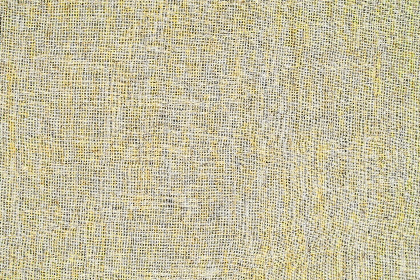 Natural linen material textile canvas Fabric texture background Close-up detail of fabric natural color Hemp material pattern design wallpaper. can be used as background or for graphic design photo