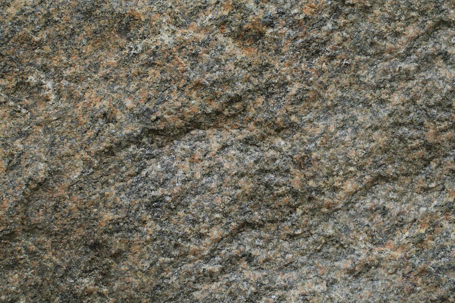Abstract natural rock stone granite grunge rusty metal texture design background natural color stone material granite design wallpaper. Close-up detail of natural stone photo