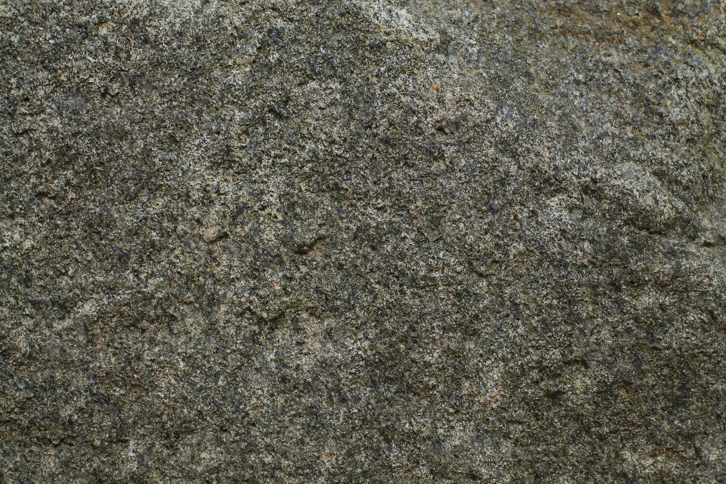 Abstract natural rock stone granite grunge rusty metal texture design background natural color stone material granite design wallpaper. Close-up detail of natural stone photo