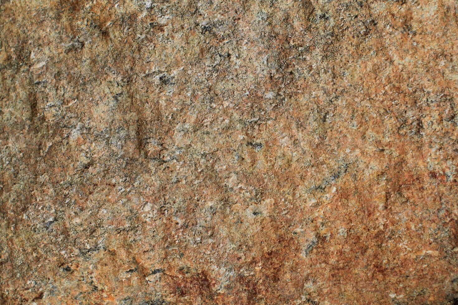 Abstract natural rock stone granite grunge rusty metal texture design background natural color stone material granite design wallpaper. Close-up detail of natural stone photo