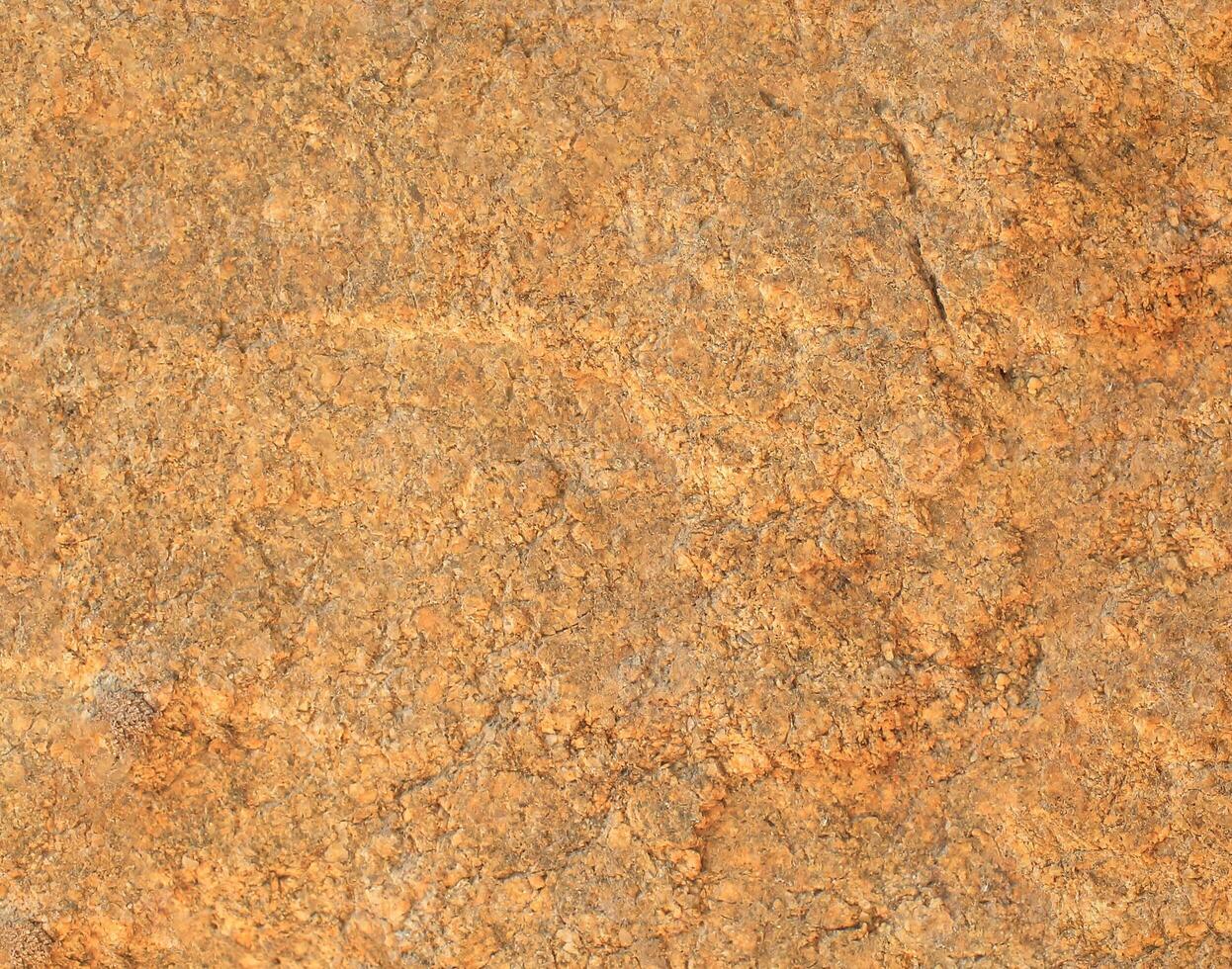 Abstract natural rock stone granite grunge rusty metal texture design background natural color stone material granite design wallpaper. Close-up detail of natural stone photo