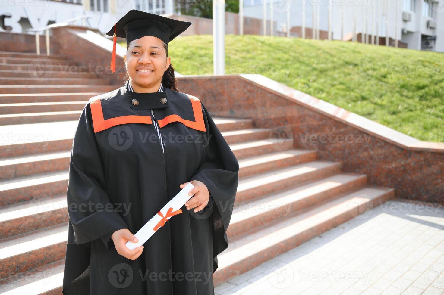pretty african female college graduate at graduation photo