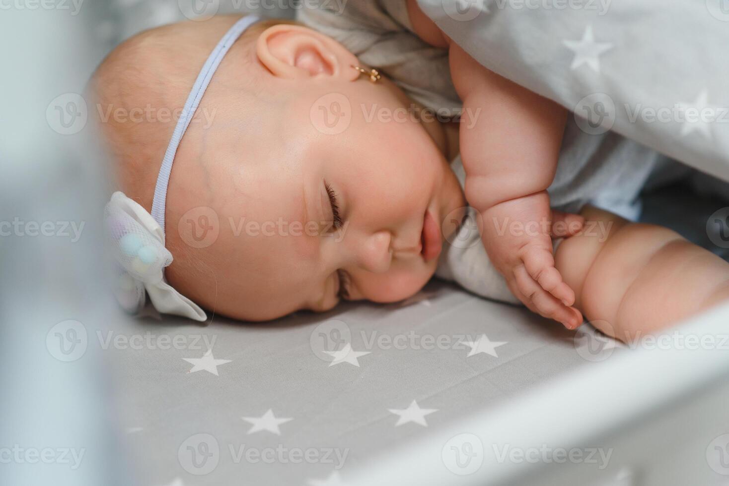 Newborn baby sleep first days of life. Cute little newborn child sleeping peacefully photo
