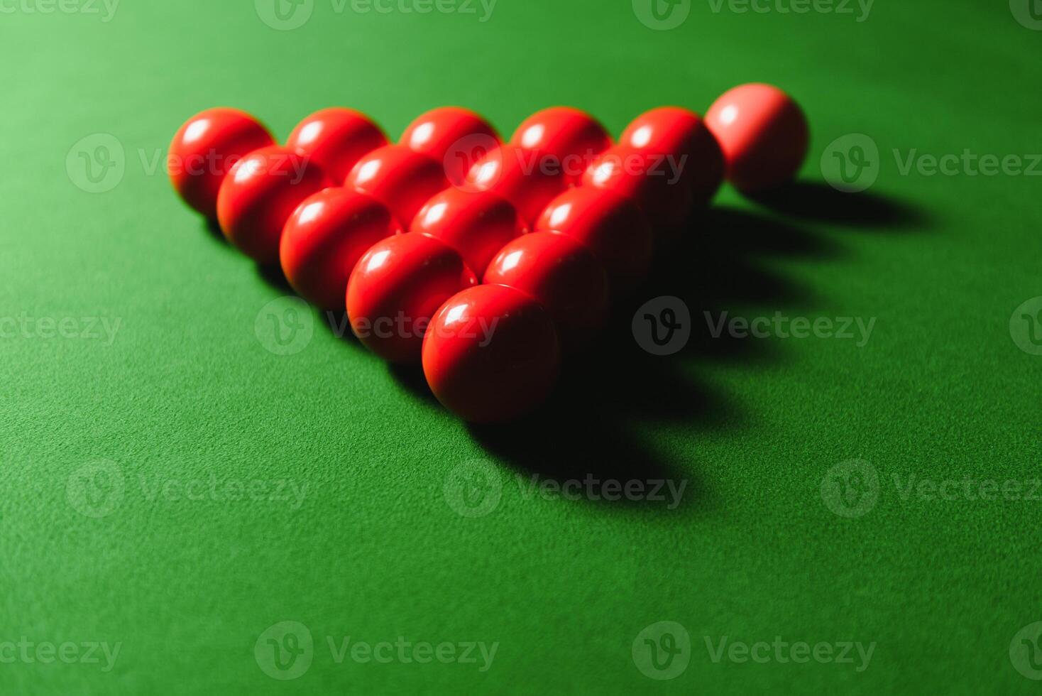 Snooker balls on the table in the pub at night. photo