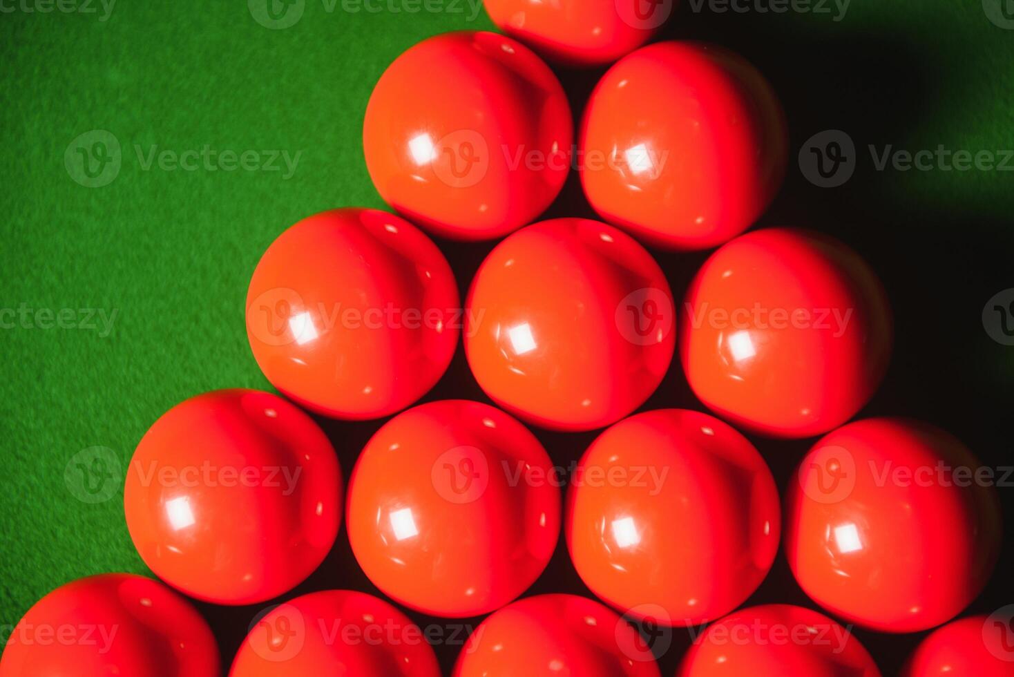 snooker balls on green surface, shallow depth of field photo